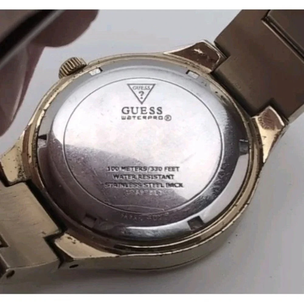 GUESS Women's U15078L1 Quartz Analog Chrono Dress Watch. Good Tone w Crystal 
